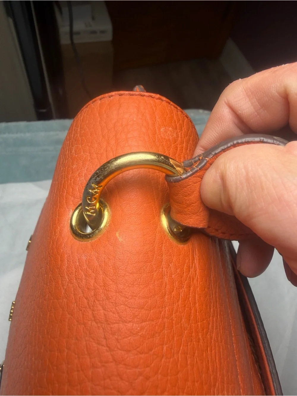 Structured Orange Leather Satchel with Top Handle and Crossbody Strap